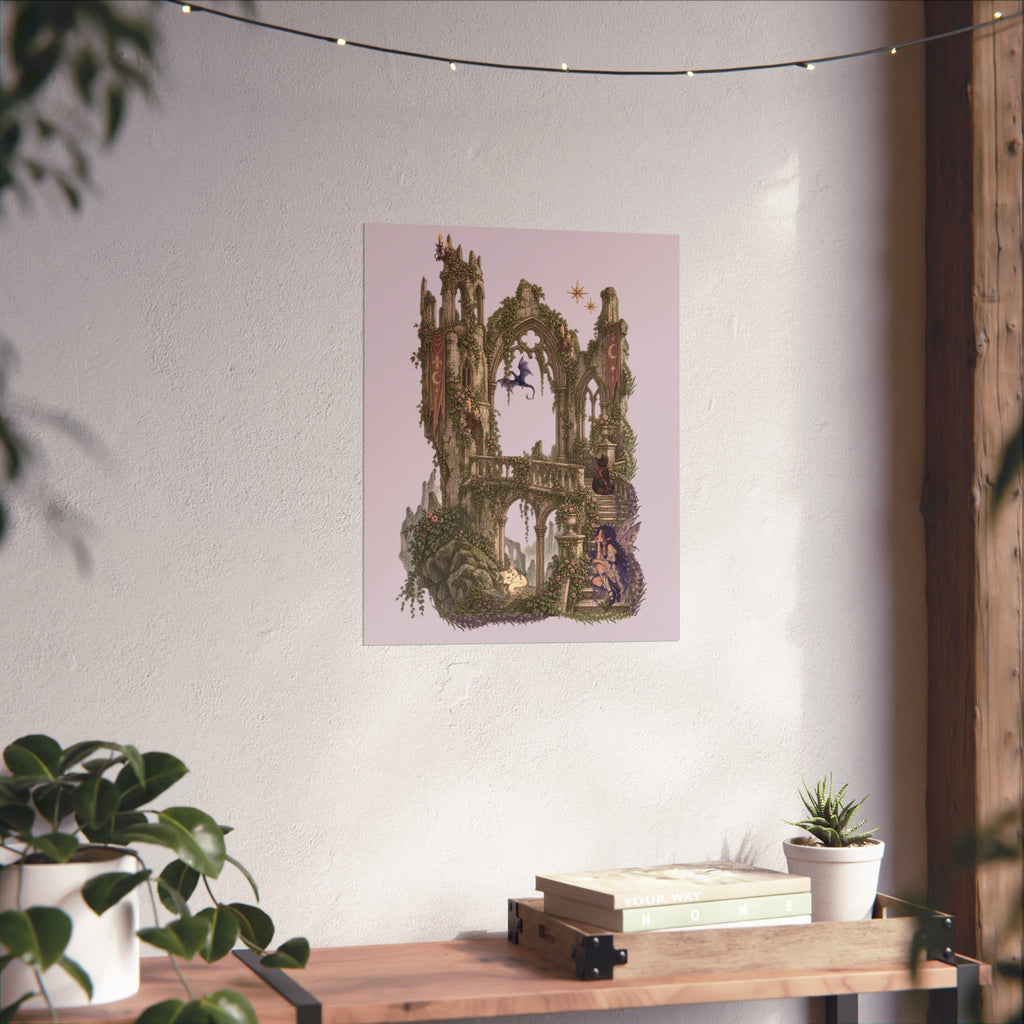 A vertical art print featuring a whimsical, fantasy-style illustration of a mossy stone tower and archway under a pale pink sky, displayed on a textured white wall above a wooden console table with plants