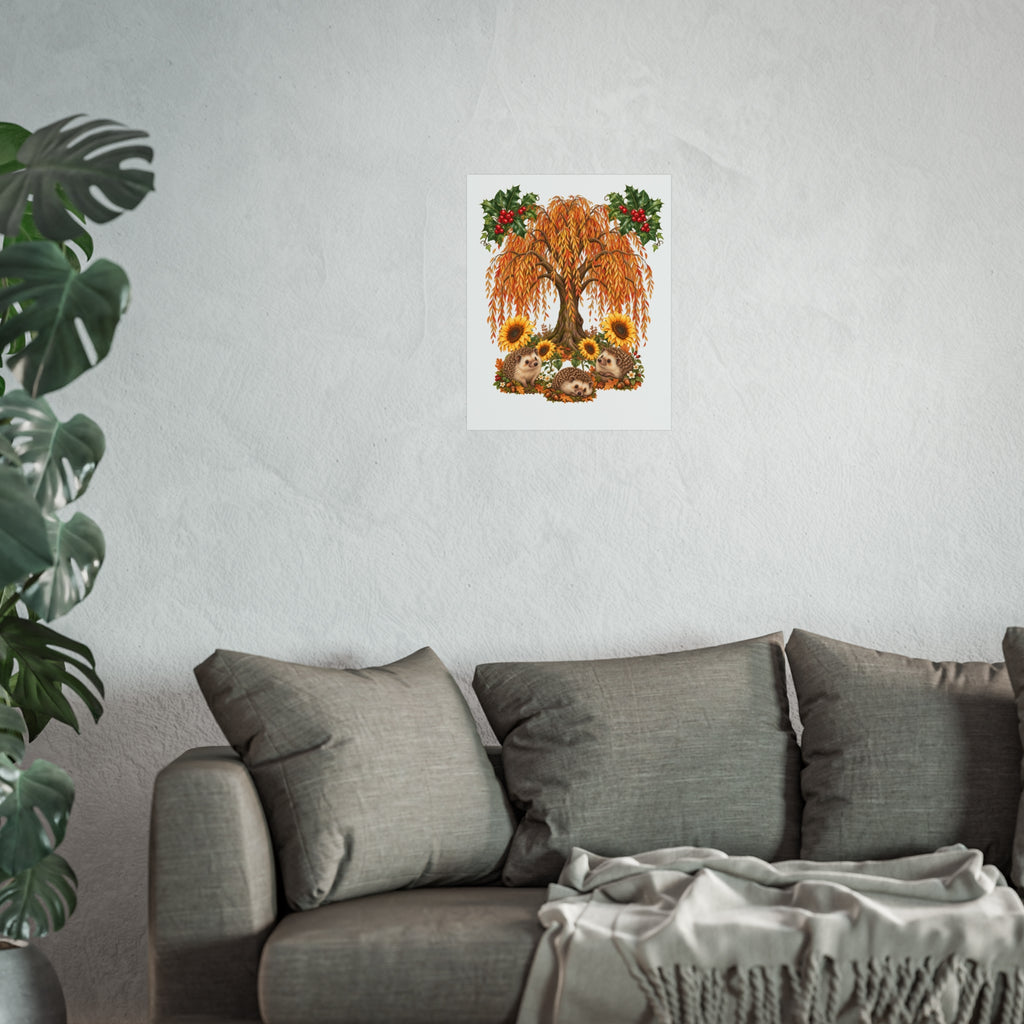 A framed wall art print featuring a stylized orange autumn tree with sunflowers and green leaves, displayed above a gray sofa in a modern living room setting with a potted plant on the left.